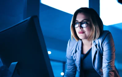 Photo of a woman working on her computer